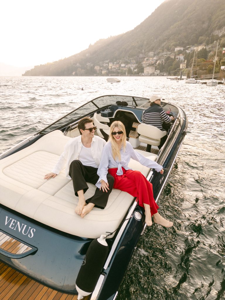 A couple enjoying a romantic private tour on Lake Como
